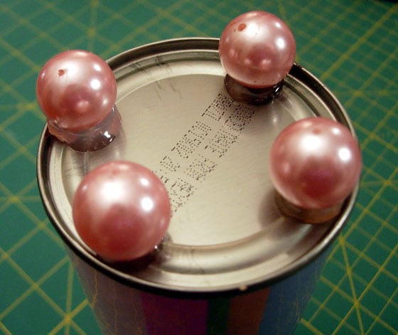 repurposed orange juice can used in Desk Set