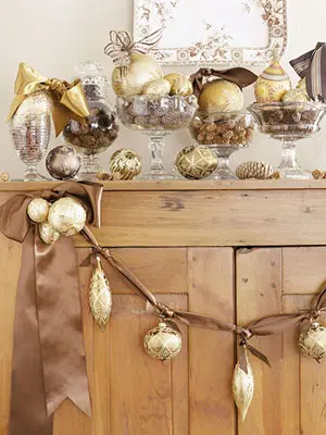 Small Christmas ornaments on a silk string made to be a garland.