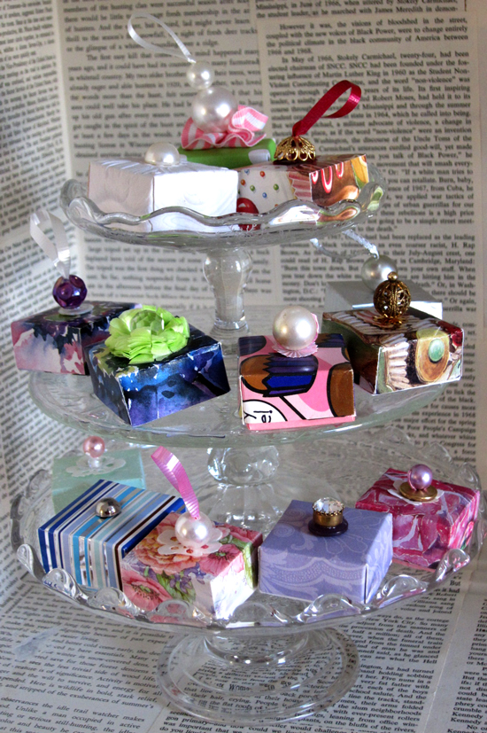 a collection of colorful and tiny Gift Boxes made using old greeting cards