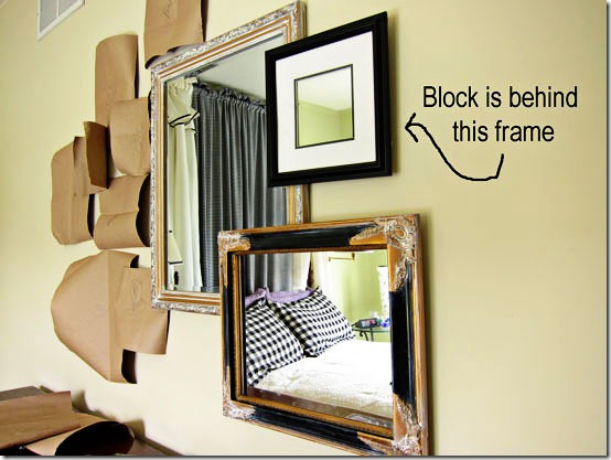 Process of hanging mirrors on wall