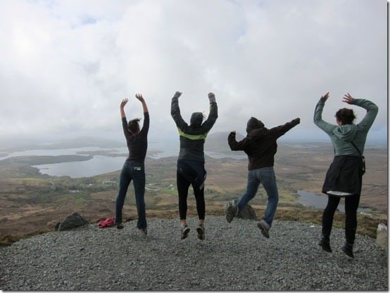 Ireland-Girls-at-half-way mark up mountain and jumping up and down