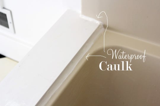 Bathtub decorating ideas using molding and wood trim.