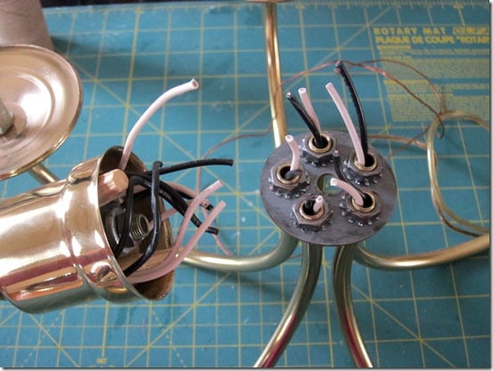 Brass Chandelier sections taken apart to turn into an outdoor light.