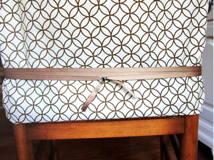 Ribbon tied around a dining room chair back