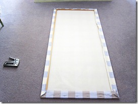 Staple fabric to wood frame