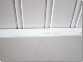 applying-caulk-against-bead