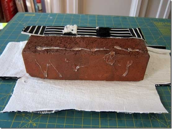 Glue-fabric-to-brick