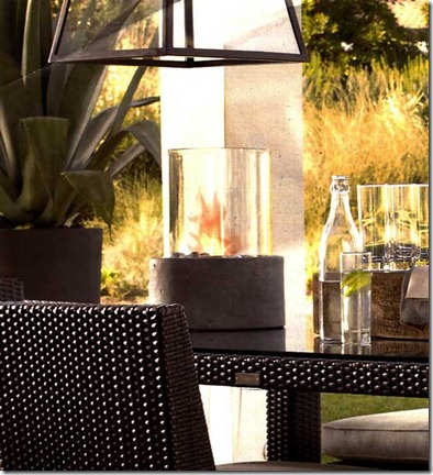 Restoration-Hardware-Table with concrete fire column on top.