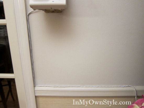 Landline telephone wire hiding trick