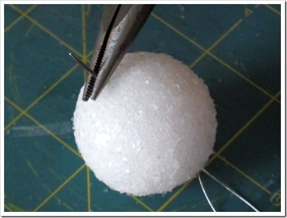String-wire-through-ball