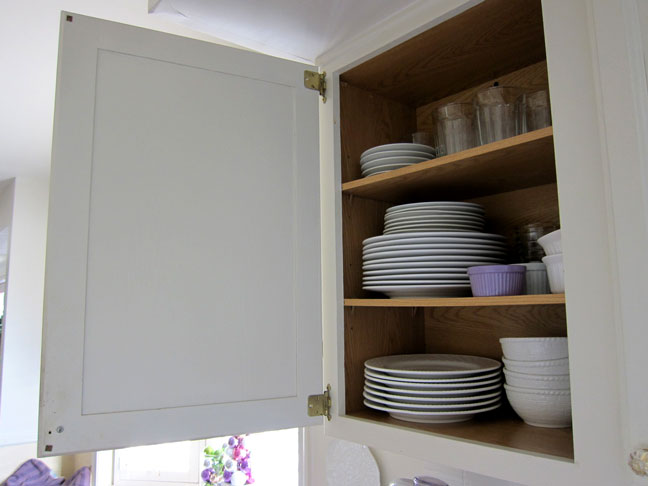 Open door on kitchen door where a ribbon memo board will be placed.