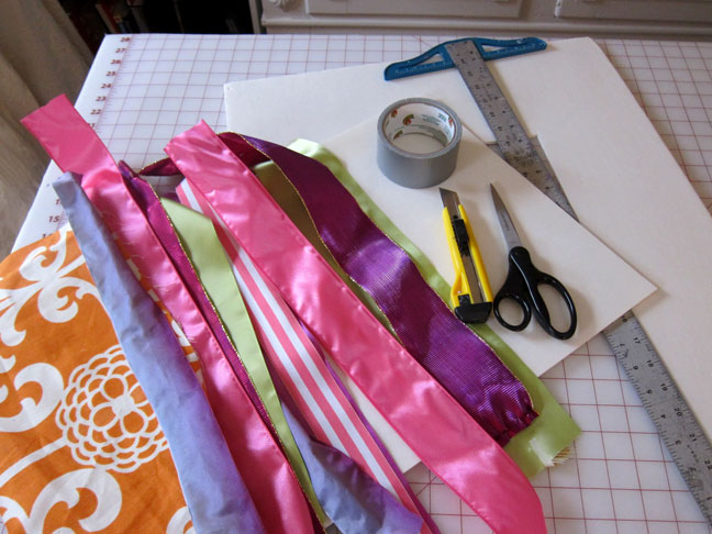 piles of ribbon to make a ribbon memo board