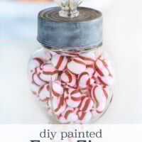 Faux Zinc painted tuna can to make a top for a candy jar.