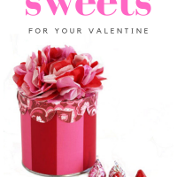 Red and Pink striped round gift box with tissue paper flower top to place a Valentine's Day gift it or candy.
