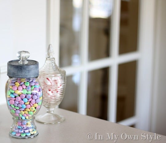glass canister filled with pastel Easter candies