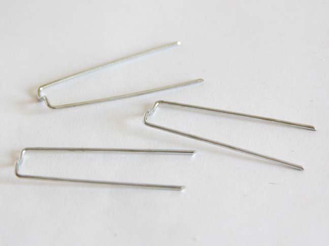 Floral picks to attach spring fabric to wreath.