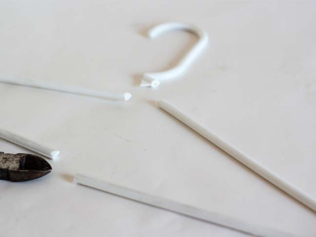 How to cut a hanger to make bunny ears for a spring bunny wreath.