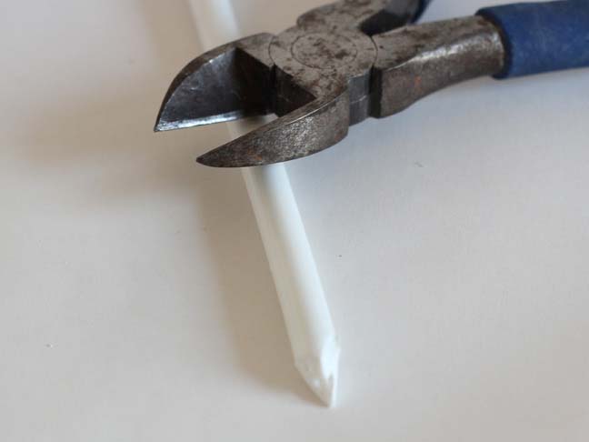 Tool to cut a plastic hanger to make ears for an Easter Bunny wreath.