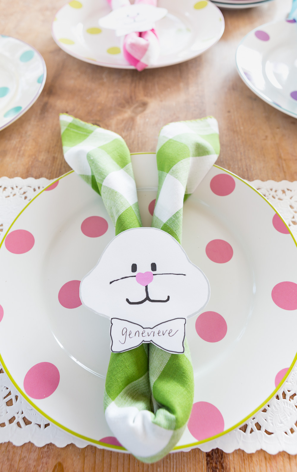 Pastel Green Buffalo Check Napkin folded to make an Easter bunny napkin ring.