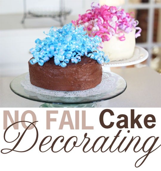 Image that shows two cakes on cakes stands decorating with curling ribbons.