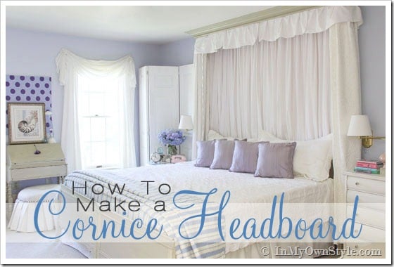 A Cornice Headboard on the wall n a white and blue bedroom