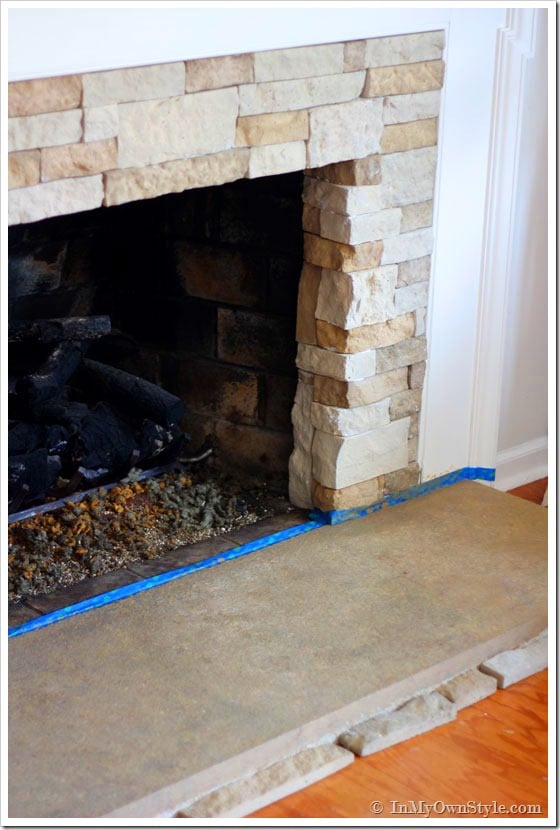 How to add stone over a brick fireplace