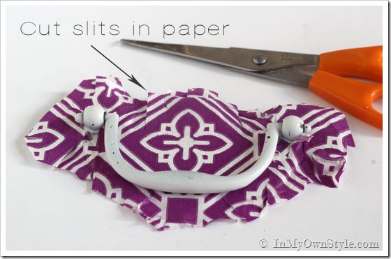 How to update a brass drawer pull using paper napkins. Photo shows how to wrap the pull.