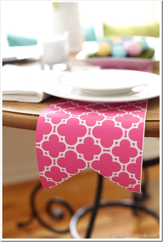 pink and white gift wrap cut to make an Easter table dining table runner.
