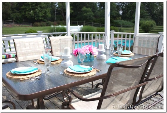 Spray painted outdoor-table and chairs on deck