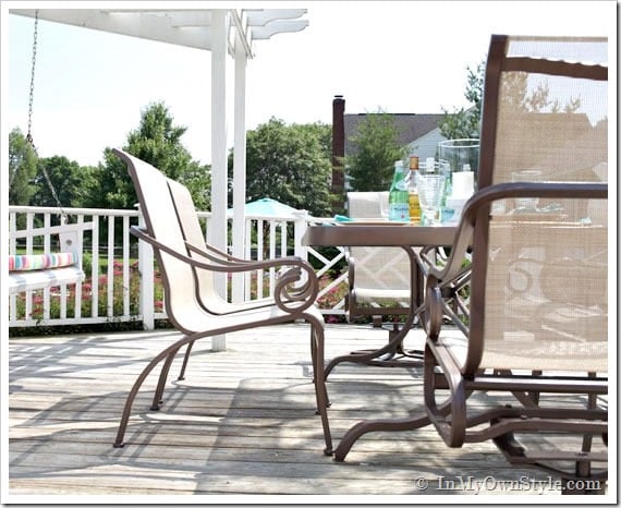 Painted outdoor dining table and sling style chairs