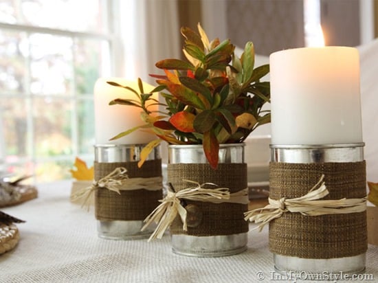 Fall vase ideas using multiple DIY rustic vases made from tin cans and fabric.