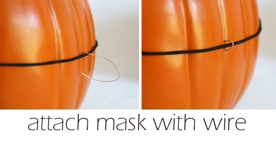 using wire to attach mask to carved pumpkin.