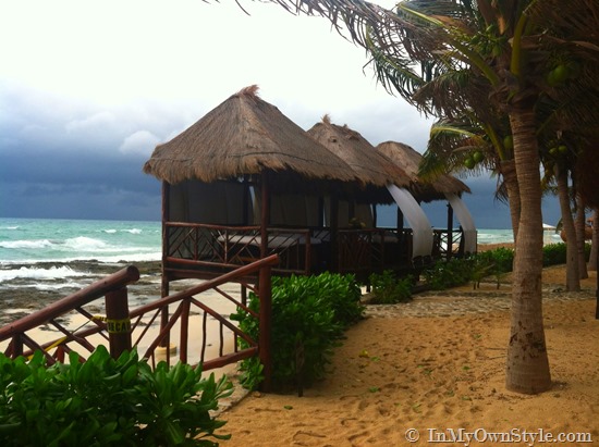 beach huts in stormy weather
