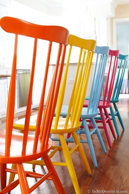 Furniture-Makeover-ideas - spray paint wood chairs in a variety of colors