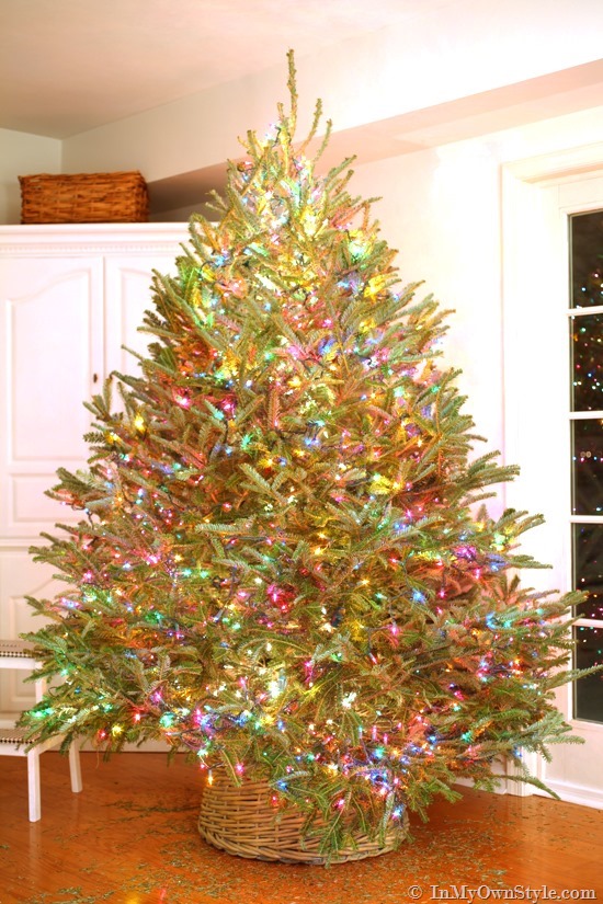String-Christmas-tree-from-top-to-bottom #HowtoputlightsonaChristmastree #PuttinglightsonaChristmastree #BestwaytostringlightsonaChristmastree #BestwaytoputlightsonaChristmastree #HowtolightaChristmastree #HowtohanglightsonaChristmastree #Christmastreewithlights #Christmastreelighting #Christmastreelights #Christmastreewithlights finished Christmas tree lit with colorful lights
