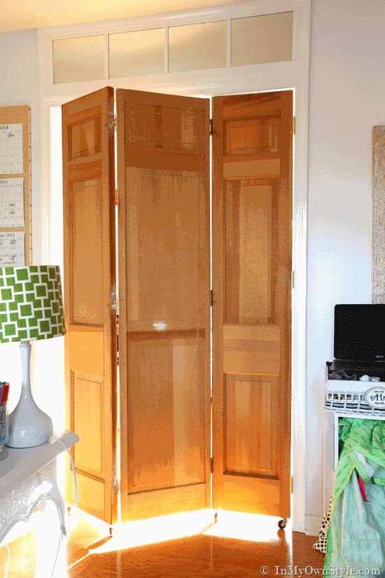 Thrift-store-bifold-doors-made-into-a-rolling-door