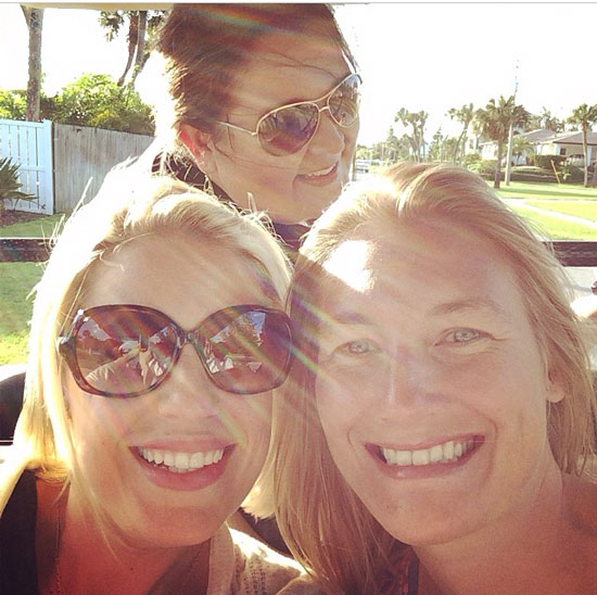 Bloggers-riding-on-a-golf-cart-in-Anna-Maria-Island