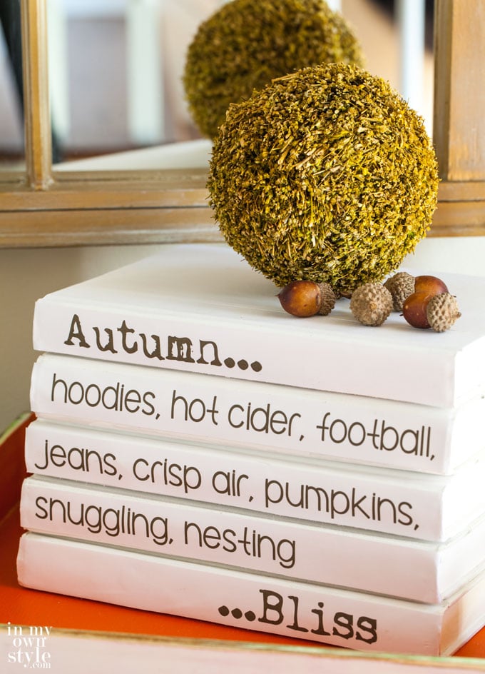Fall-quote-on-a-stack-of-books