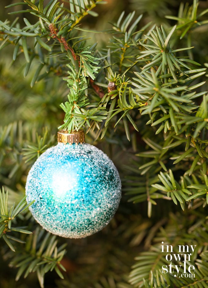 Christmas ornament-hanging on tree using a small section of a garland tie.
