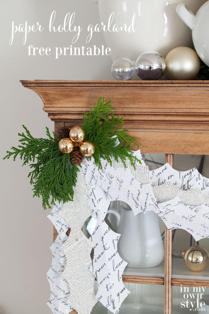Make this pretty Christmas garland using paper or download the free printable sheet with script handwriting to make a holiday garland of any length. Christmas craft ideas using paper and greenery. | In My Own Style