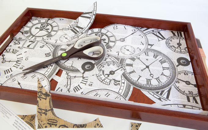 Thrift-store-tray-makeover using clock themed scrapbook paper