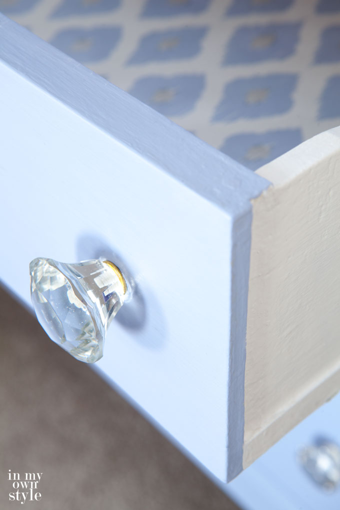 Furniture makeover idea that uses gift wrap to line