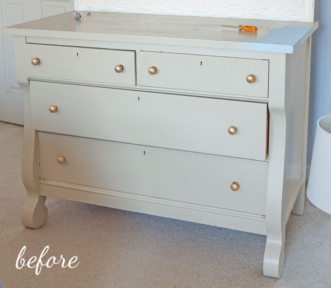 Pale green dresser before getting a makeover with chalk paint