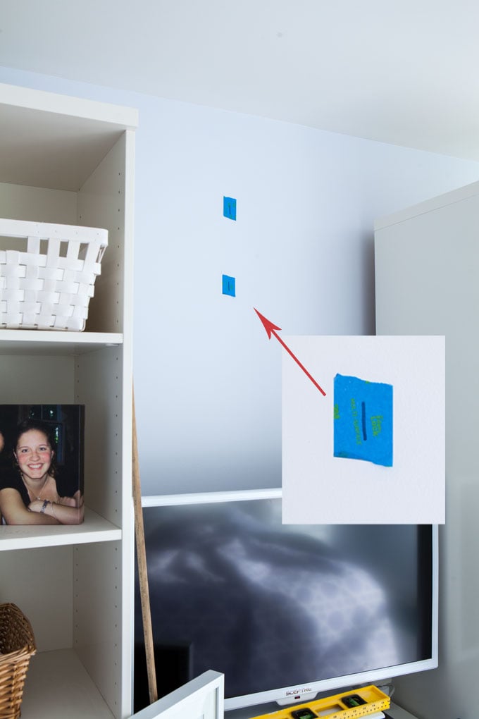 Use this picture hanging centering tip the next time you are creating a gallery wall in your home