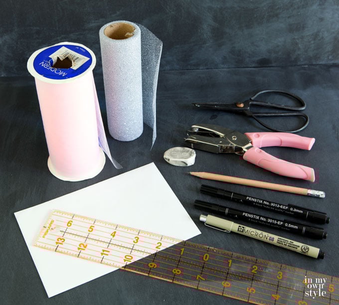 Supplies needed to make a the gift of a check and card into something extra special