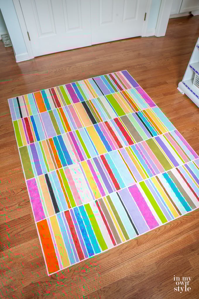 Paint a rug on a floor using a FLOR or Dash and Albert rug as inspiration