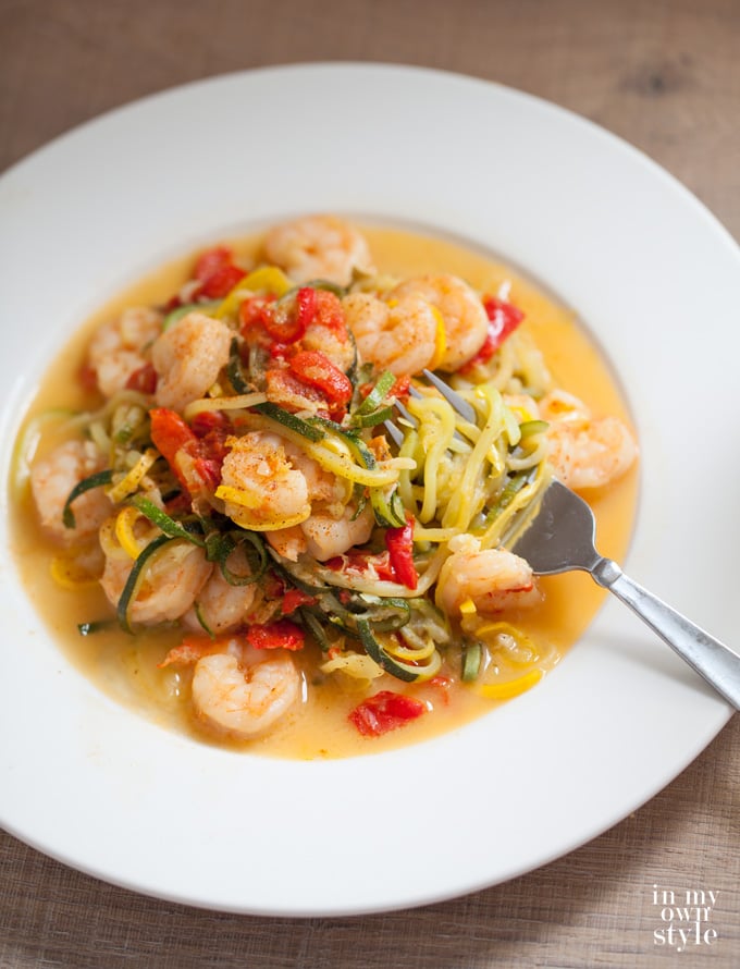 Garlic Shrimp zoodle recipe that uses zucchini and yellow squash. You won't even miss the pasta.