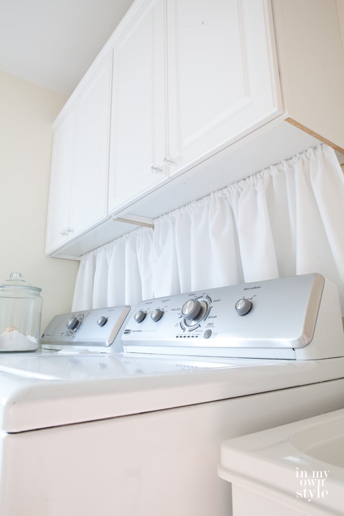 how to hide washer and dryer connections on a wall in a laundry room