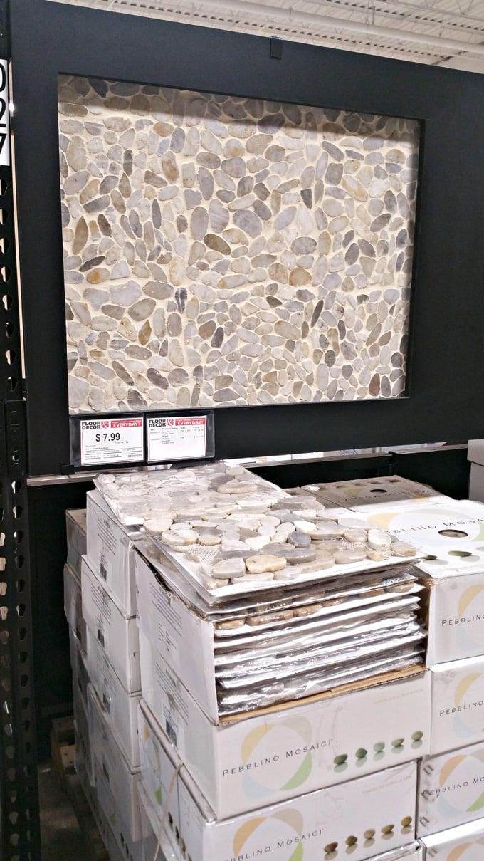 Round stone tile on display at Floor and Decor