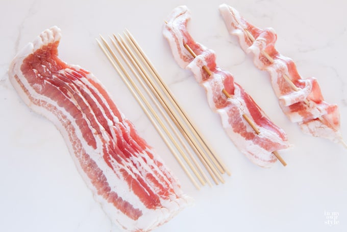 Bacon on counter with skewers